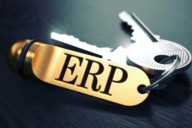 A close-up of a set of silver keys on a dark surface, with a gold keychain tag labeled "ERP" attached to the keyring.